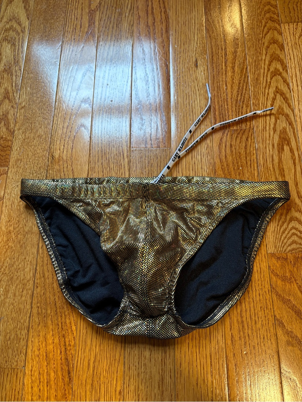 Metallic Gold Men’s Swim Briefs with Black Lining